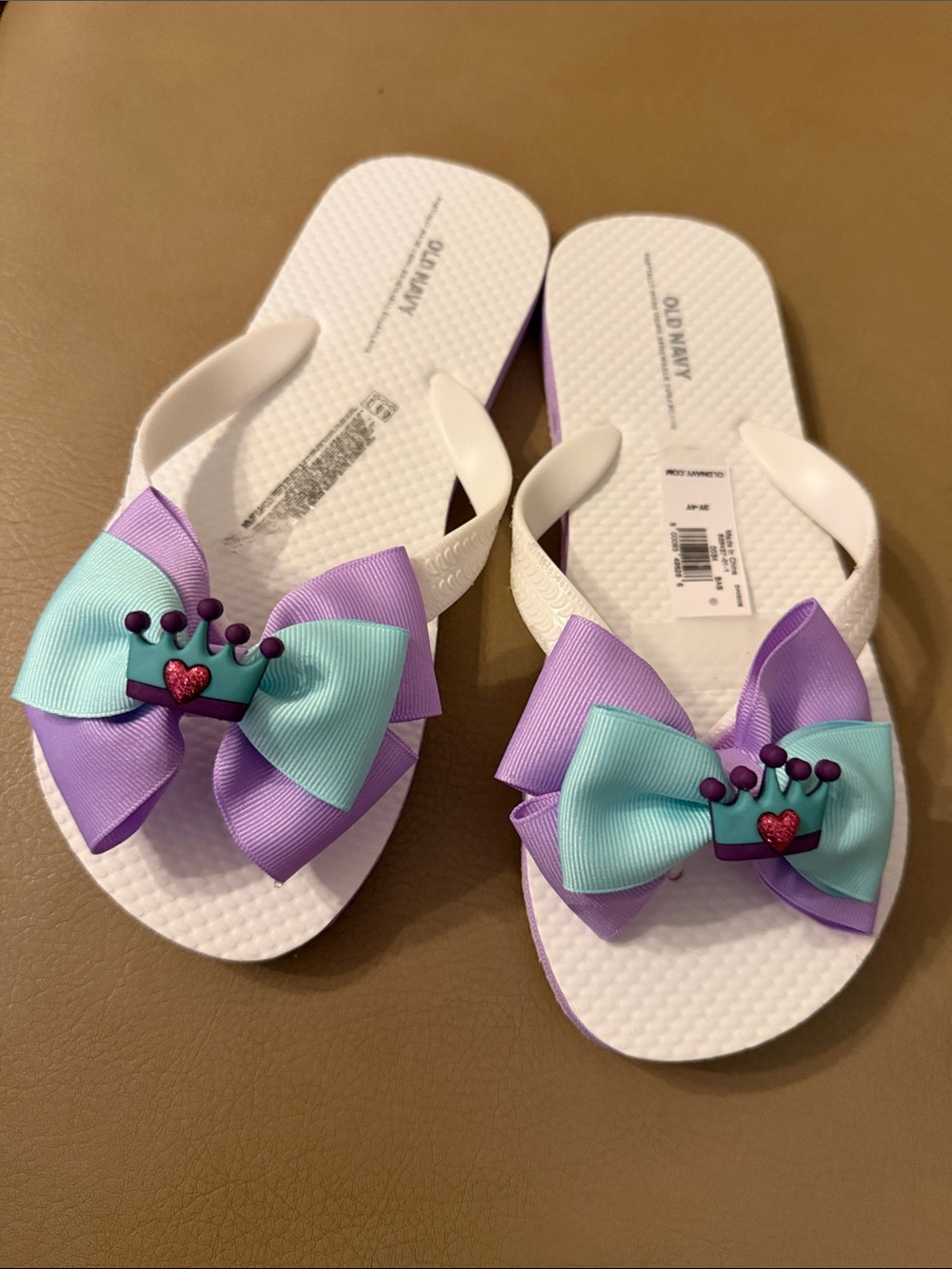 Old Navy White Flip Flops with Purple & Aqua Bow Crown